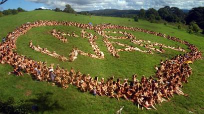 750 nude women form a heart around the words 'No War' on a hillside near the town of Byron bay, 700 kilometers (435 miles) north of Sydney, Australia, Saturday, Feb. 8, 2003. The women said they wanted to send Prime Minister John Howard a message to recall Australian troops from the middle east. (AP Photo/Icon Images)